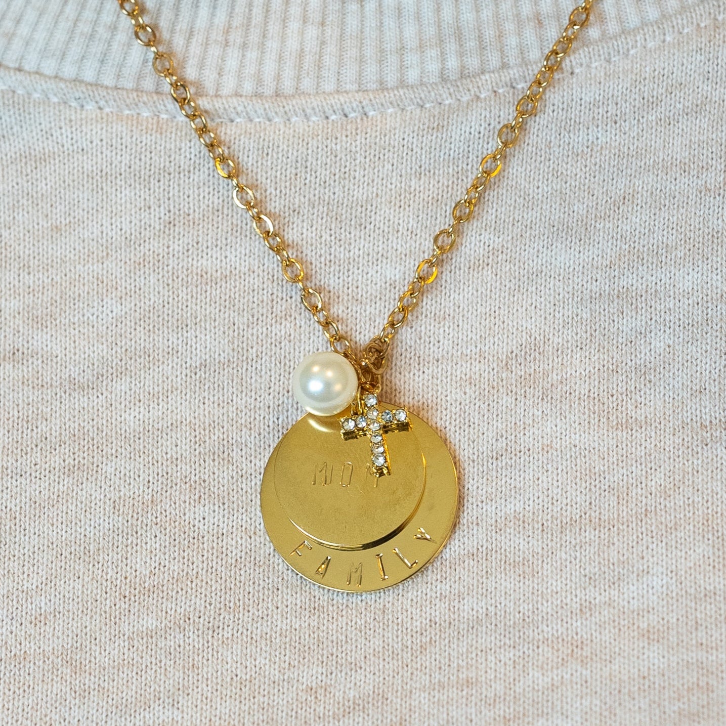 Custom necklaces that feature beautifully hand-stamped pendants and charms. Birthstones can be added to any pendant